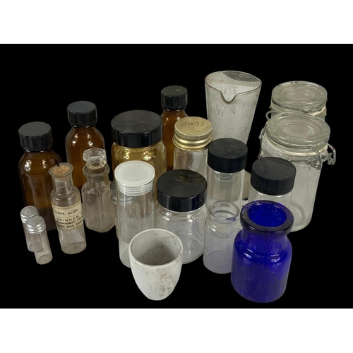 372 - A quantity of vintage chemist bottles etc.