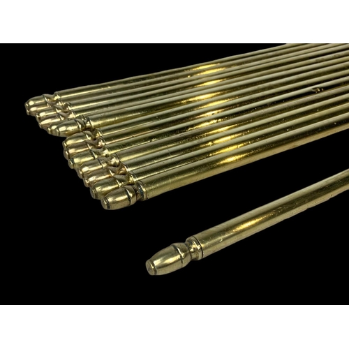 380 - 14 vintage brass stair rods. 81cm. With a pair of brass wall lights