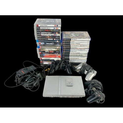 141a - A PlayStation 2 with PlayStation 2 and PlayStation 3 games, with controllers, memory card and leads