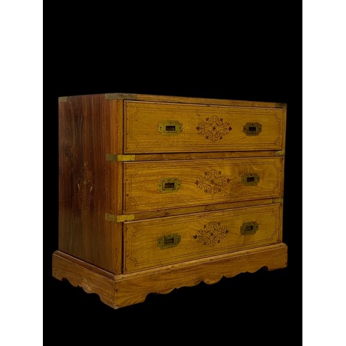 895 - A campaign style rosewood with brass inlaid 3 drawer chest.  63x33x51cm