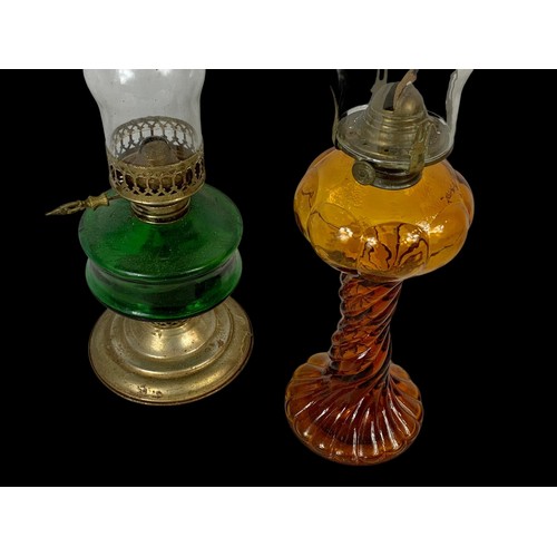 730 - 2 vintage oil lamps.