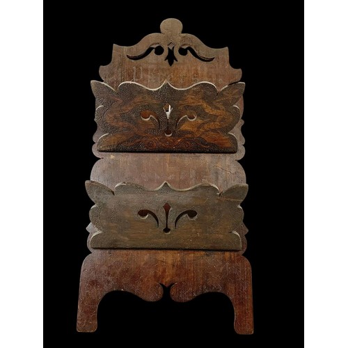 208j - A late Victorian paper rack with Pokerwork decoration of mythical dragons.  37x78cm