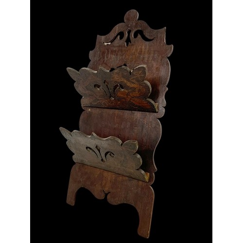 208j - A late Victorian paper rack with Pokerwork decoration of mythical dragons.  37x78cm