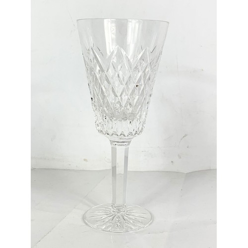 503E - A set of 11 Tyrone Crystal wine glasses.  18.5cm