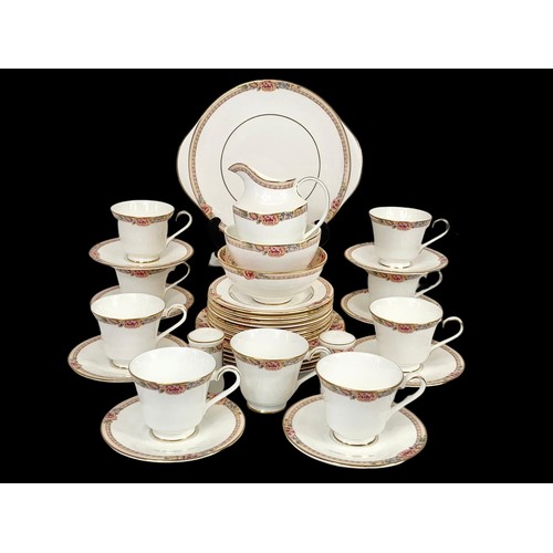 503G - A 31 piece Royal Doulton “Darjeeling” tea set.