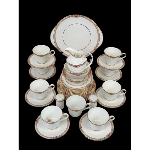 503G - A 31 piece Royal Doulton “Darjeeling” tea set.