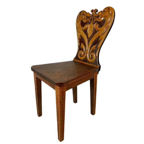 1171 - Victorian carved back hall chair.