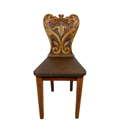 1171 - Victorian carved back hall chair.