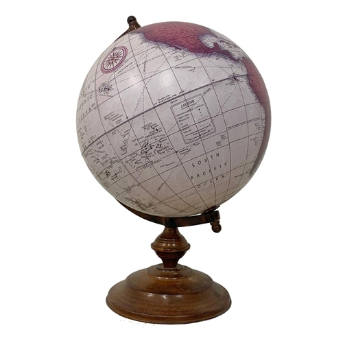 13 - A large table top revolving globe. 47cm.