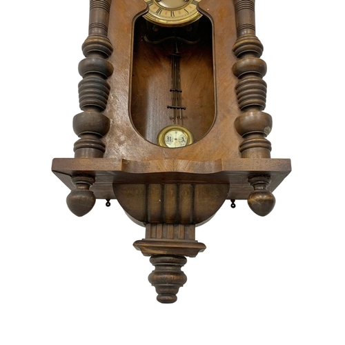 359 - A Victorian Vienna wall clock with pendulum. No glass. 43 x 110cm.