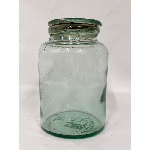 282 - A large 19th century Kilner Brothers Thornhill Lees glass jar and lid. 14.5 x 23cm.