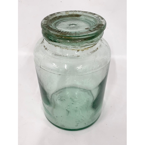 282 - A large 19th century Kilner Brothers Thornhill Lees glass jar and lid. 14.5 x 23cm.