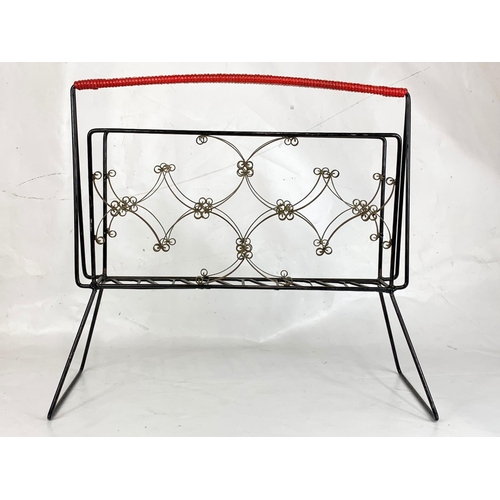 102 - A 1950s magazine rack, 55cm