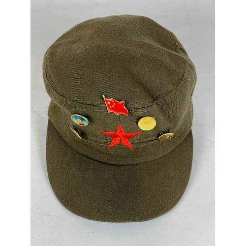 106 - A Chinese military cap and badges