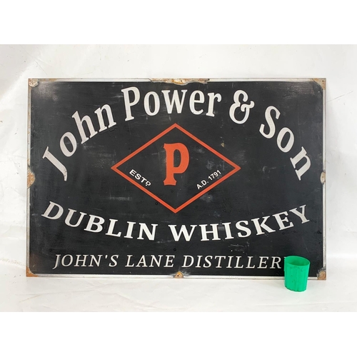 117 - A large quality heavy metal advertising sign, John Power & Son. 92cm x 61cm