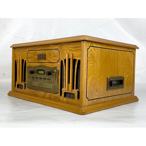 130 - AN old style radio record player, 46cm x 36cm