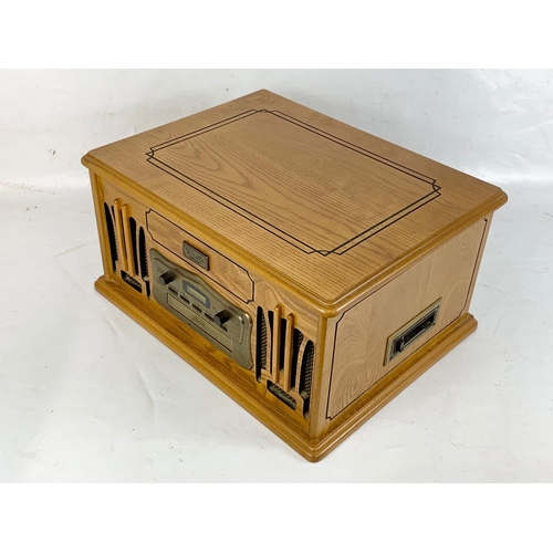 130 - AN old style radio record player, 46cm x 36cm