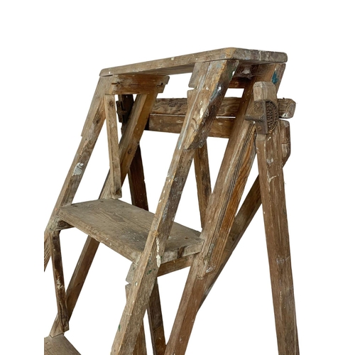 135 - A large set of early 20th century stepladders, 205cm