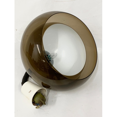 140 - A large Guzzini mid century light fitting and shade, 36cm