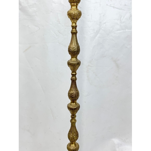 144 - A 1970s brass floor lamp, 136cm