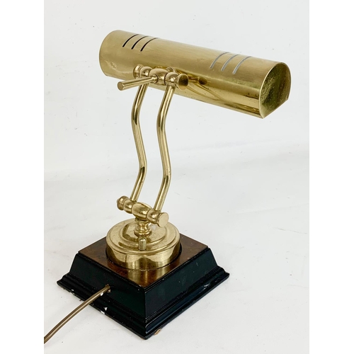 148 - A brass desk lamp, 27cm