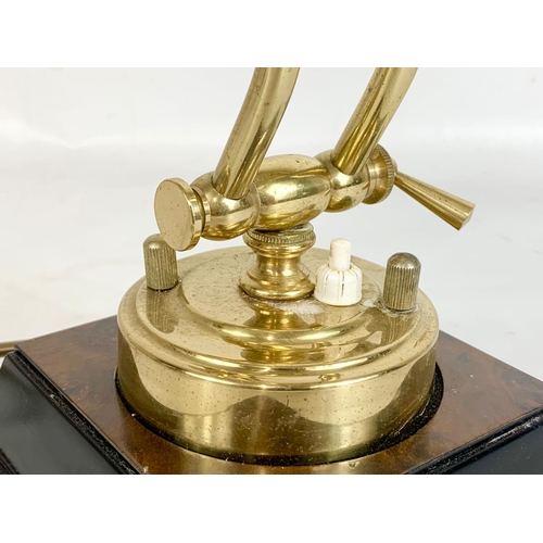 148 - A brass desk lamp, 27cm