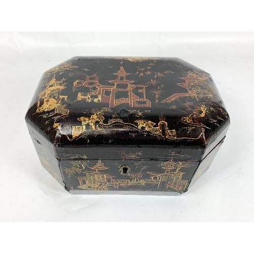 150 - An Oriental Chinoiserie lacquered jewellery box, 20cm