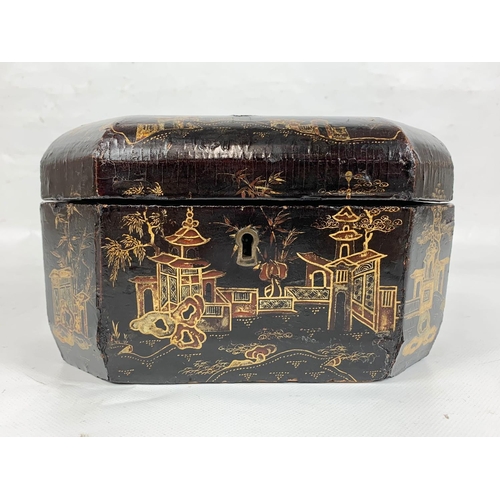 150 - An Oriental Chinoiserie lacquered jewellery box, 20cm