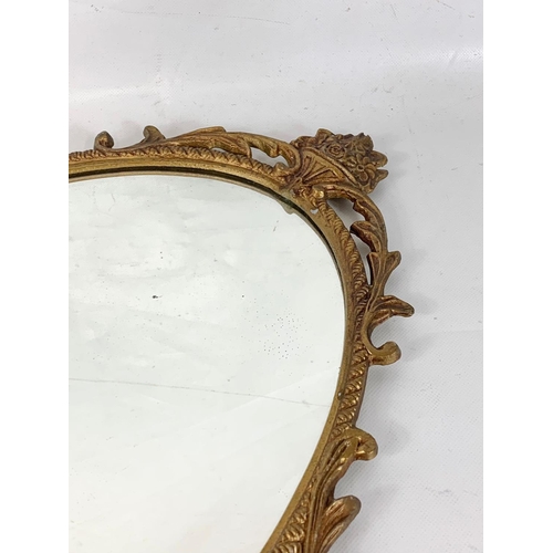 162 - A gilt framed mirror, 40cm x 67cm