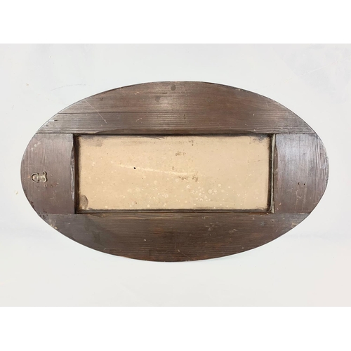 165 - A vintage bevelled mirror, 40cm x 69cm