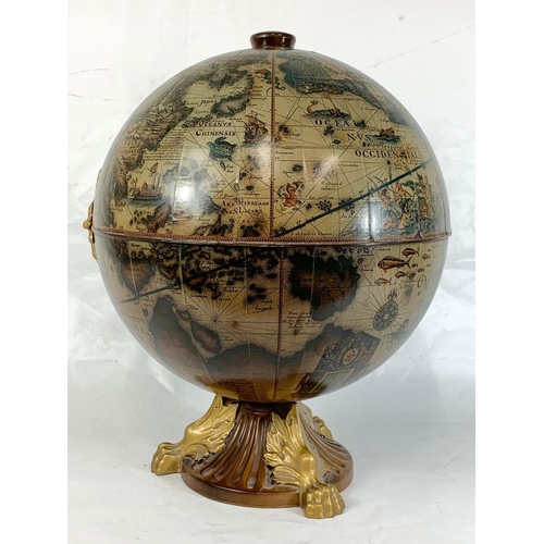 17 - A decorative table top drinks globe, 55.5cm