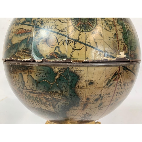 17 - A decorative table top drinks globe, 55.5cm