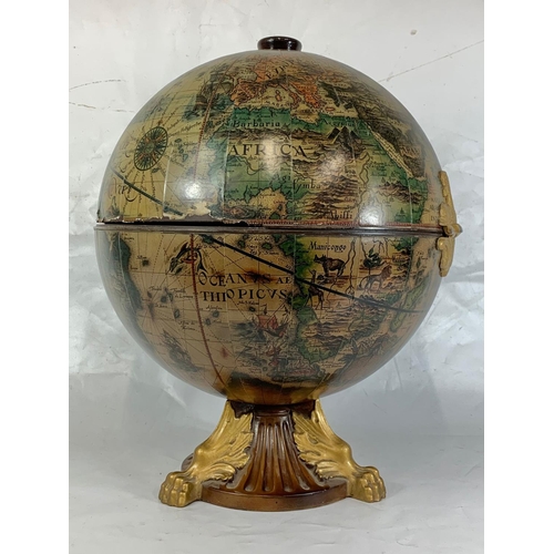 17 - A decorative table top drinks globe, 55.5cm