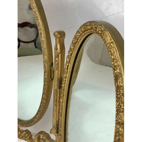 174 - A vintage gilt dressing mirror