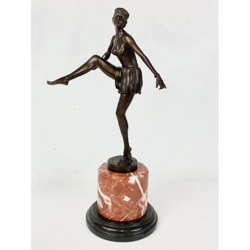 177 - An Art Deco style bronze figure on marble base.  48cm