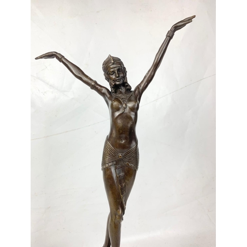 178 - An Art Deco style bronze figure on marble base.  55.5cm