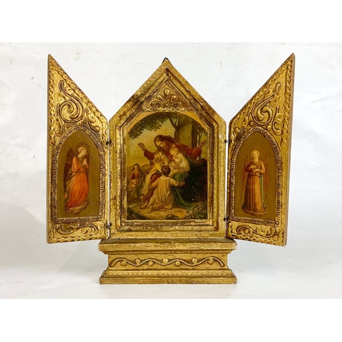 18 - An early 20th century gilt triptych, 24cm x 23cm