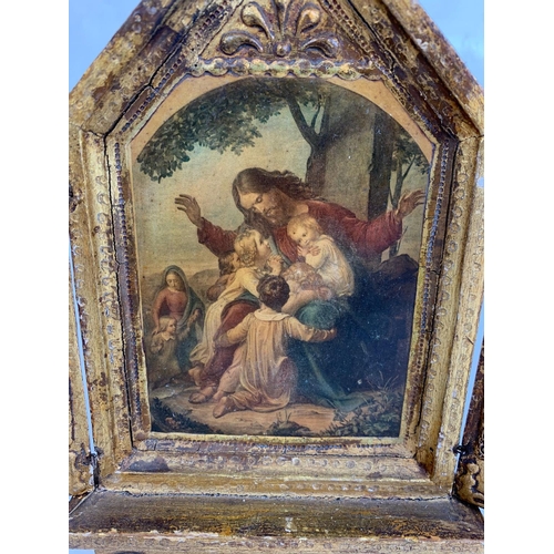 18 - An early 20th century gilt triptych, 24cm x 23cm