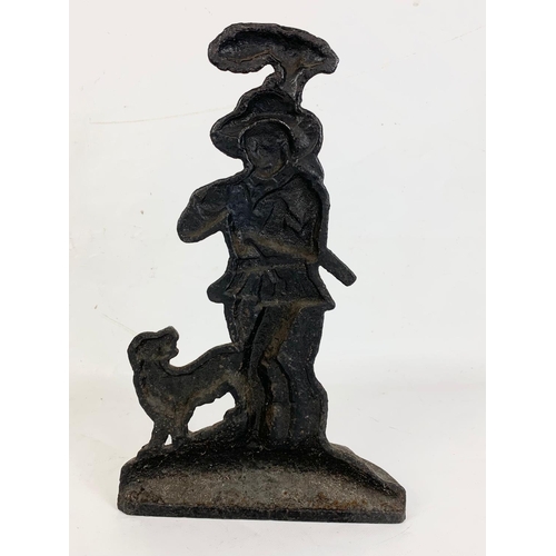 182 - A Victorian style cast iron door stop.  39cm