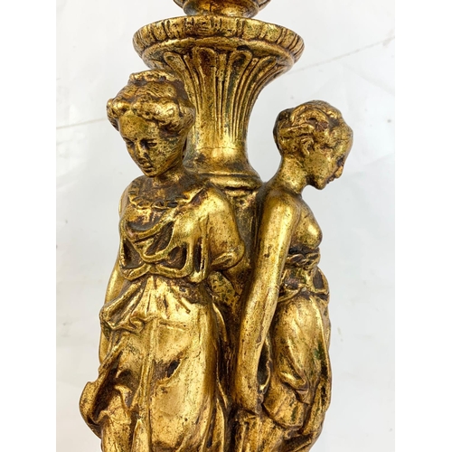 192 - A pair of vintage gilt lamps on a marble base.  50cm