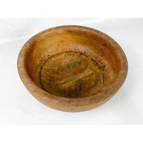 223 - A teak mid century fruit bowl stamped Con Doyle. 28cm