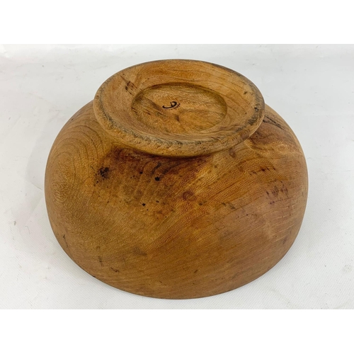 223 - A teak mid century fruit bowl stamped Con Doyle. 28cm