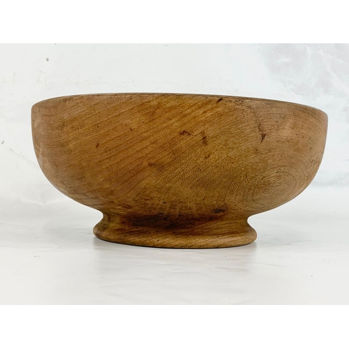 223 - A teak mid century fruit bowl stamped Con Doyle. 28cm