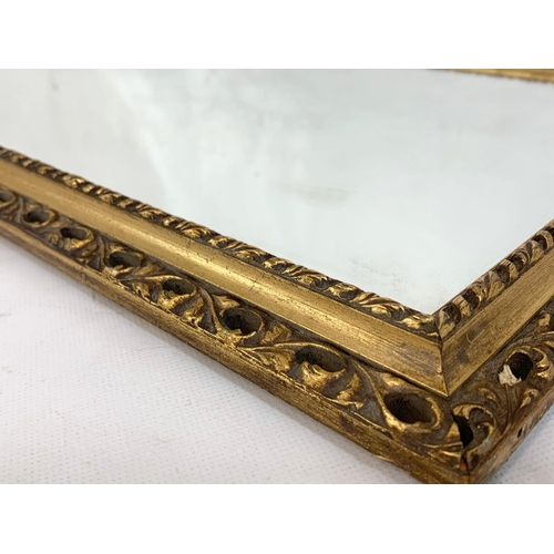 232 - Ornate gilt framed mirror, 36cm x 82cm