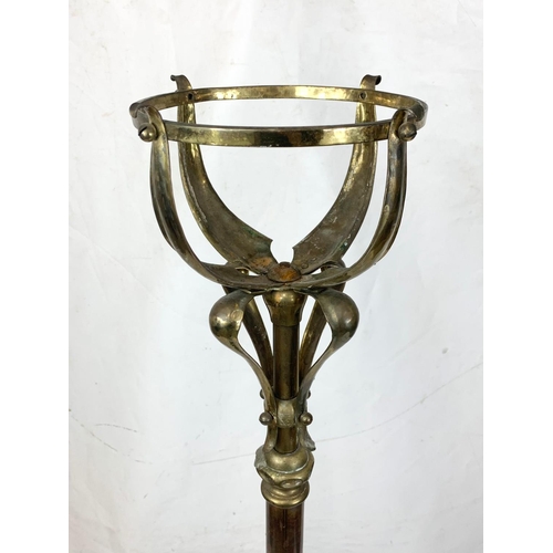 248 - A large Art Nouveau telescopic brass and copper oil lamp stand, extended 217cm