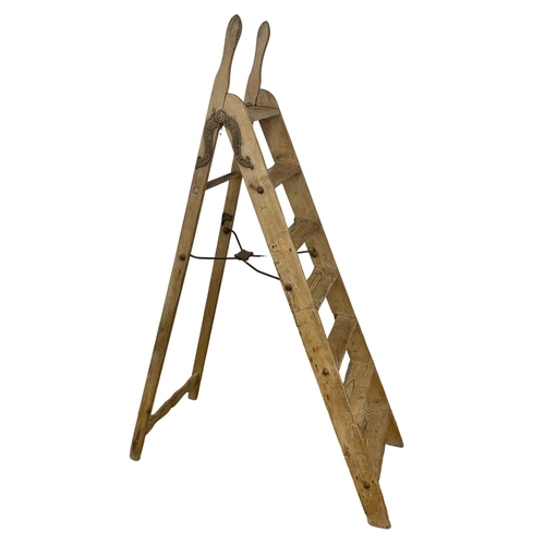 249 - A large set of Edwardian ladders, Simplex Ladder. 188cm