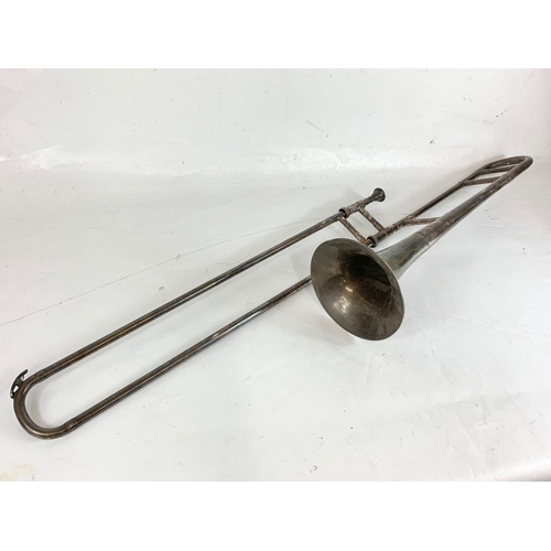 255 - A vintage trombone made by Boosey & Hawlkes Ltd. London.