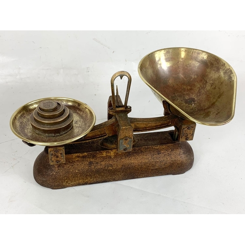 263 - A set of Edwardian scales and brass weights.