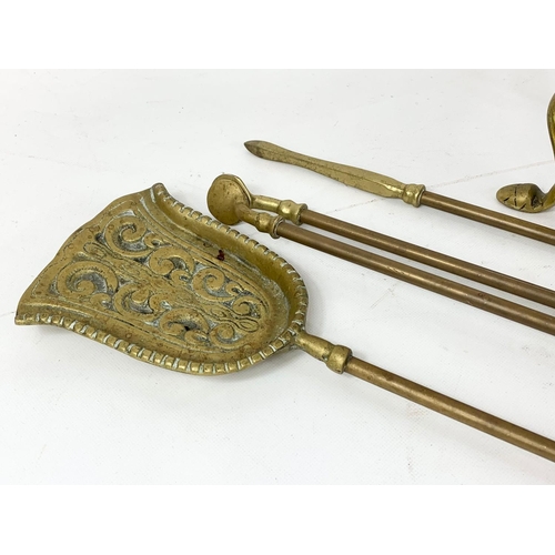 265 - Brass companion set.