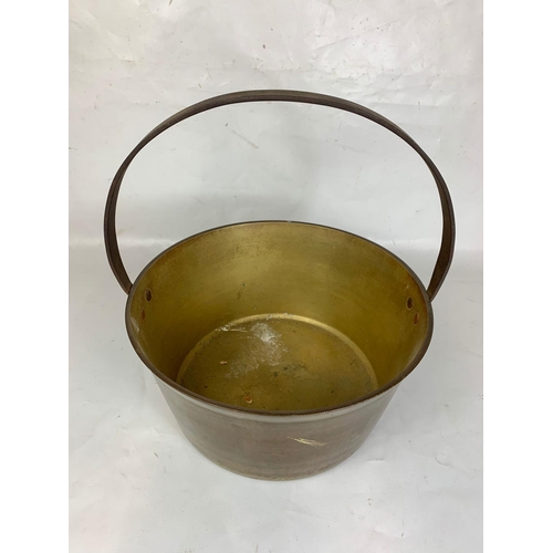 30 - A Large 19th century brass jam pot, 36cm x 38cm including handle